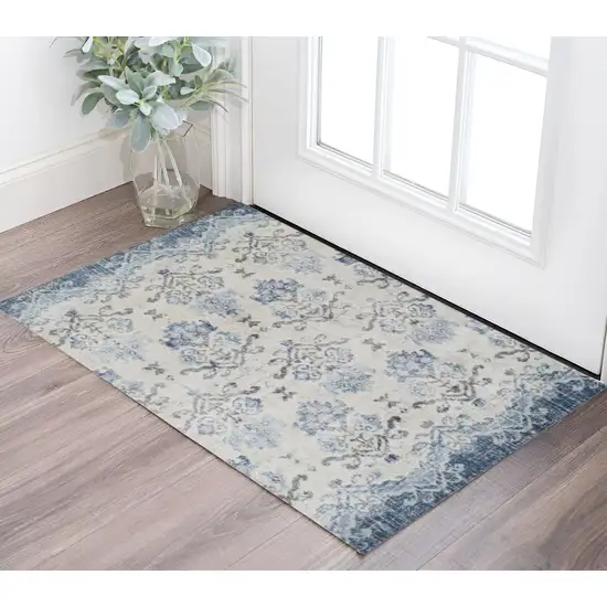 Blue and Ivory Oriental Area Rug Photo 1