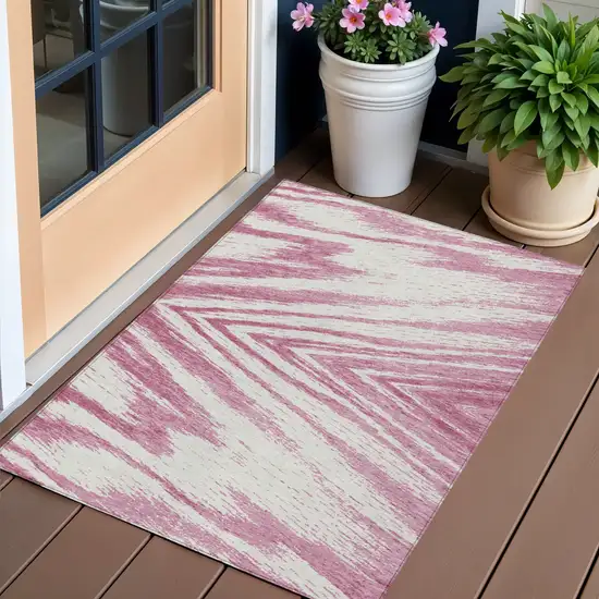 Blush And Ivory Abstract Washable Indoor Outdoor Area Rug Photo 1