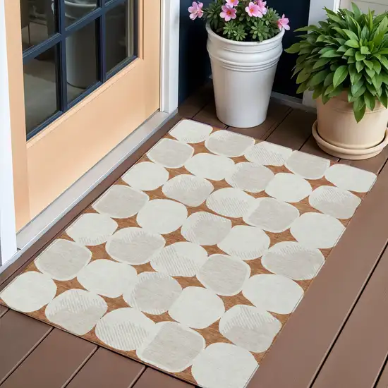 Brown And Ivory Abstract Washable Indoor Outdoor Area Rug Photo 1