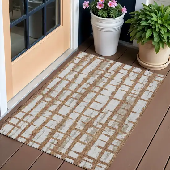 Brown Beige And Ivory Striped Washable Indoor Outdoor Area Rug Photo 1