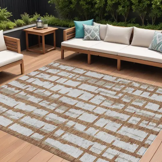 Brown Beige And Ivory Striped Washable Indoor Outdoor Area Rug Photo 1