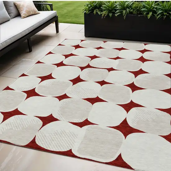 Burgundy Beige And Ivory Abstract Washable Indoor Outdoor Area Rug Photo 1