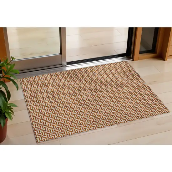 Copper And Beige Geometric Washable Indoor Outdoor Area Rug Photo 1