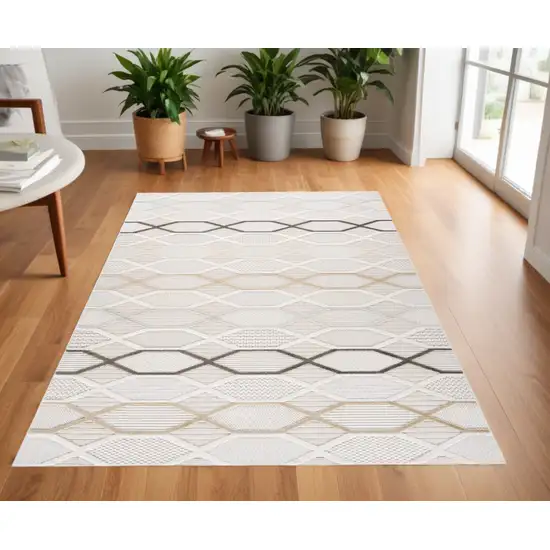 Cream and Beige Abstract Distressed Area Rug Photo 1