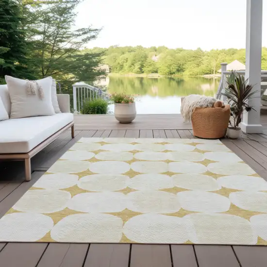 Gold And Beige Abstract Washable Indoor Outdoor Area Rug Photo 9