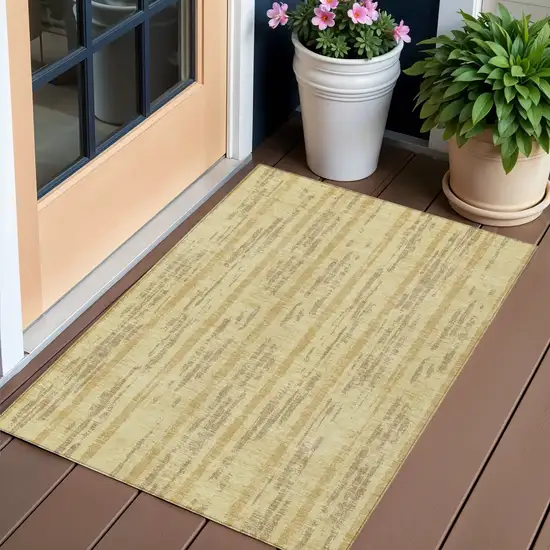 Gold And Brown Striped Washable Indoor Outdoor Area Rug Photo 1