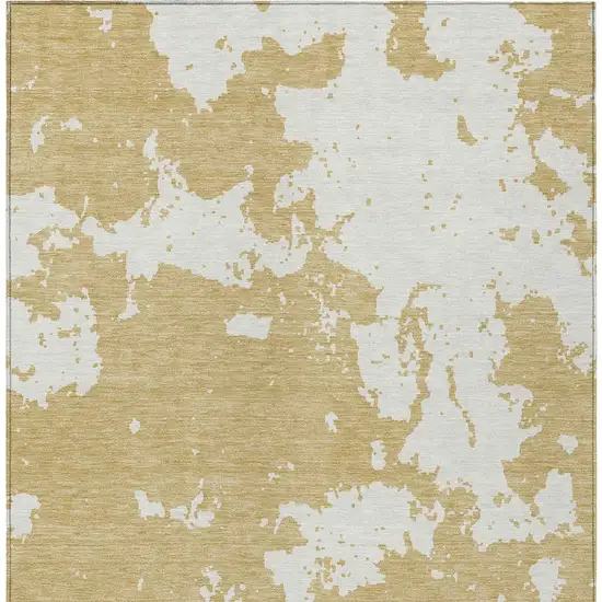 Gold And Ivory Abstract Washable Indoor Outdoor Area Rug Photo 7