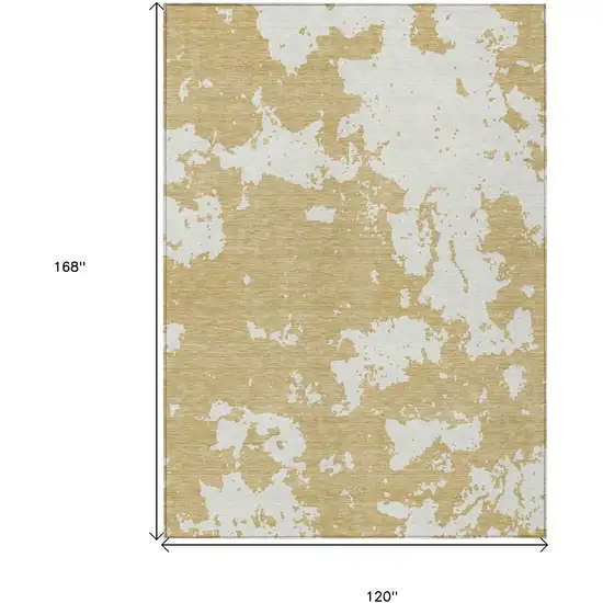 Gold And Ivory Abstract Washable Indoor Outdoor Area Rug Photo 3