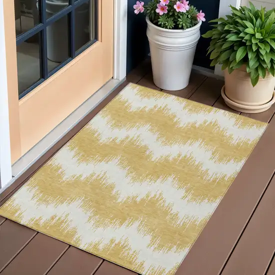 Gold And Ivory Chevron Washable Indoor Outdoor Area Rug Photo 1
