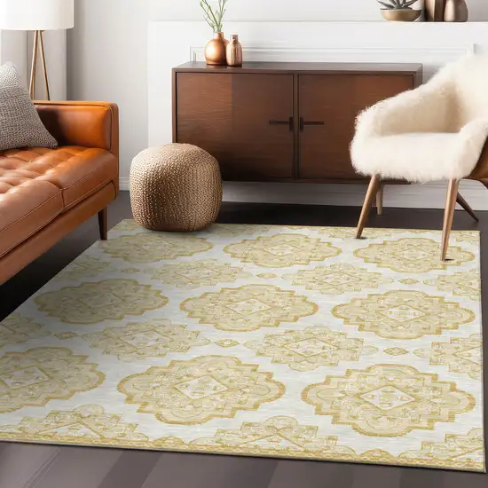 Gold And Ivory Medallion Washable Indoor Outdoor Area Rug Photo 9