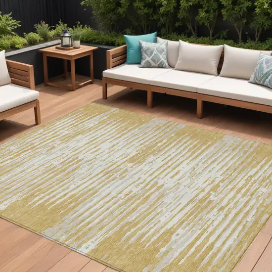 Gold Gray And Beige Striped Washable Indoor Outdoor Area Rug Photo 1