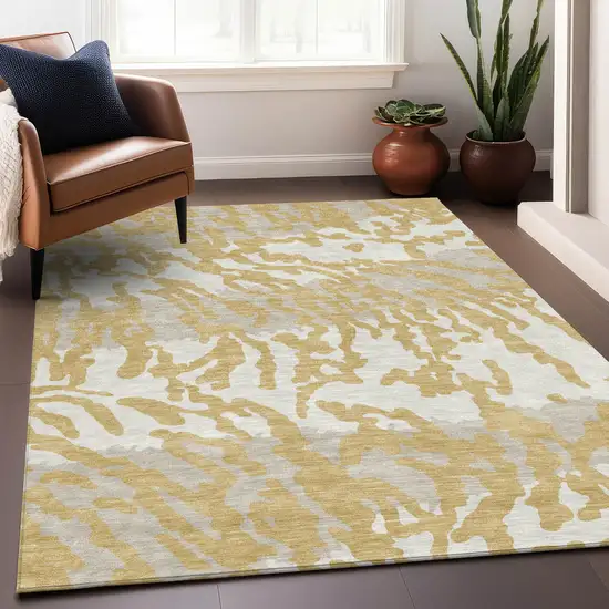Gold Gray And Ivory Animal Print Washable Indoor Outdoor Area Rug Photo 9
