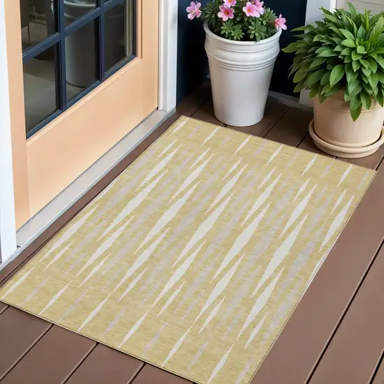 Gold Gray And Ivory Geometric Washable Indoor Outdoor Area Rug Photo 1