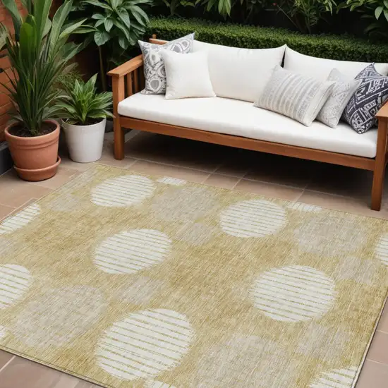 Gold Gray And Ivory Geometric Washable Indoor Outdoor Area Rug Photo 1