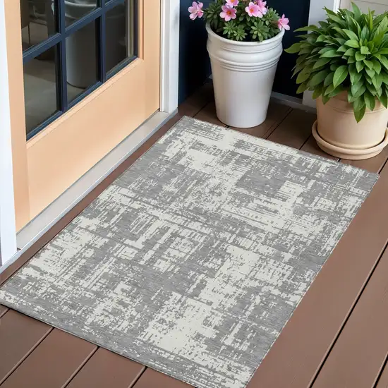 Gray And Ivory Abstract Washable Indoor Outdoor Area Rug Photo 1