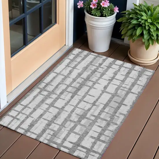 Gray And Ivory Striped Washable Indoor Outdoor Area Rug Photo 1
