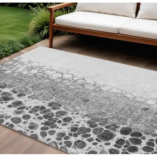 Gray Silver And Charcoal Abstract Washable Indoor Outdoor Area Rug Photo 1