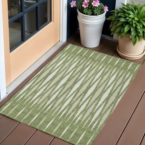 Green And Ivory Geometric Washable Indoor Outdoor Area Rug Photo 1