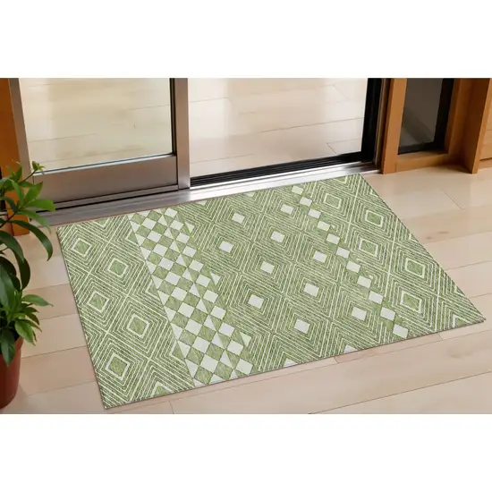 Green And Ivory Geometric Washable Indoor Outdoor Area Rug Photo 1