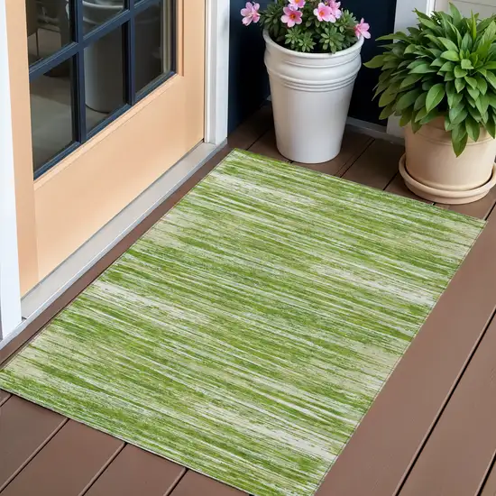 Green And Ivory Striped Washable Indoor Outdoor Area Rug Photo 1