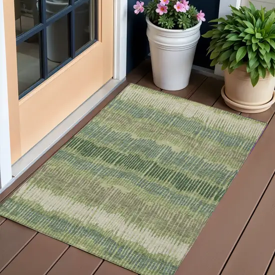 Green Gray And Ivory Striped Washable Indoor Outdoor Area Rug Photo 1