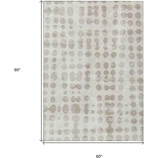 Ivory And Beige Abstract Washable Indoor Outdoor Area Rug Photo 3
