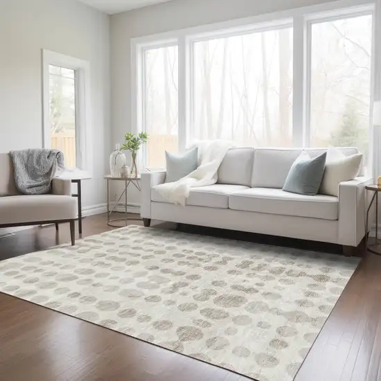 Ivory And Beige Abstract Washable Indoor Outdoor Area Rug Photo 9