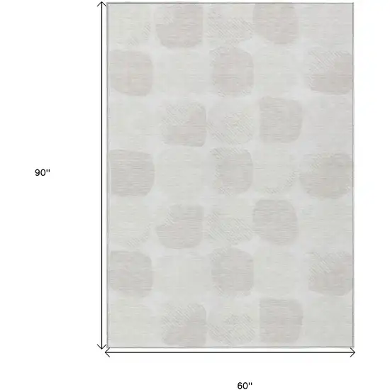 Ivory And Beige Abstract Washable Indoor Outdoor Area Rug Photo 3
