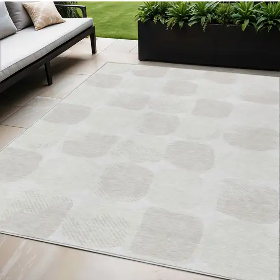 Ivory And Beige Abstract Washable Indoor Outdoor Area Rug Photo 1