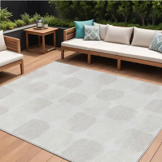 Ivory And Beige Abstract Washable Indoor Outdoor Area Rug Photo 1