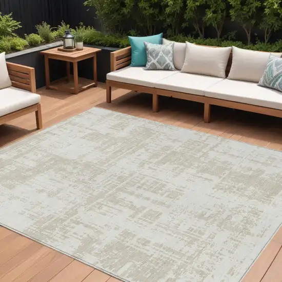 Ivory And Beige Abstract Washable Indoor Outdoor Area Rug Photo 1