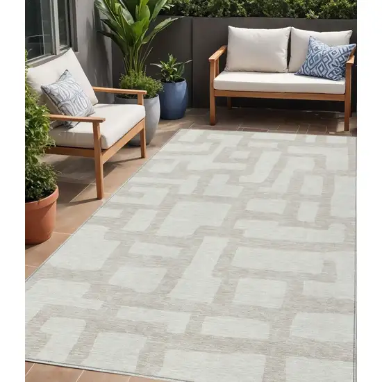 Ivory And Beige Abstract Washable Indoor Outdoor Area Rug Photo 1