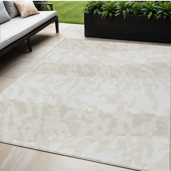 Ivory And Beige Animal Print Washable Indoor Outdoor Area Rug Photo 1