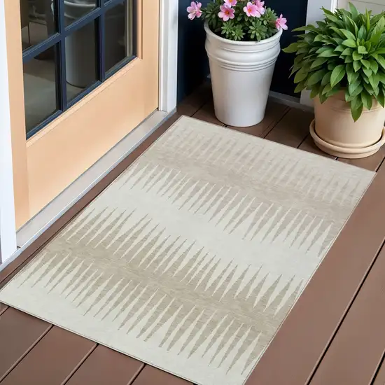 Ivory And Beige Striped Washable Indoor Outdoor Area Rug Photo 1