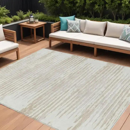 Ivory And Beige Striped Washable Indoor Outdoor Area Rug Photo 1