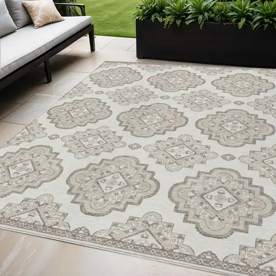 Ivory And Brown Medallion Washable Indoor Outdoor Area Rug Photo 1