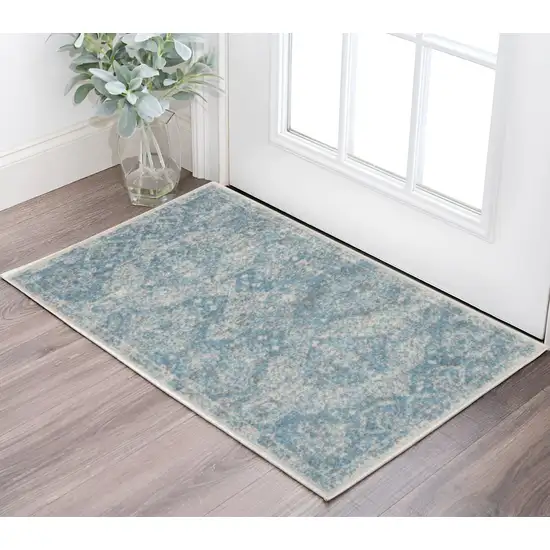 Ivory and Light Blue Oriental Distressed Area Rug Photo 1