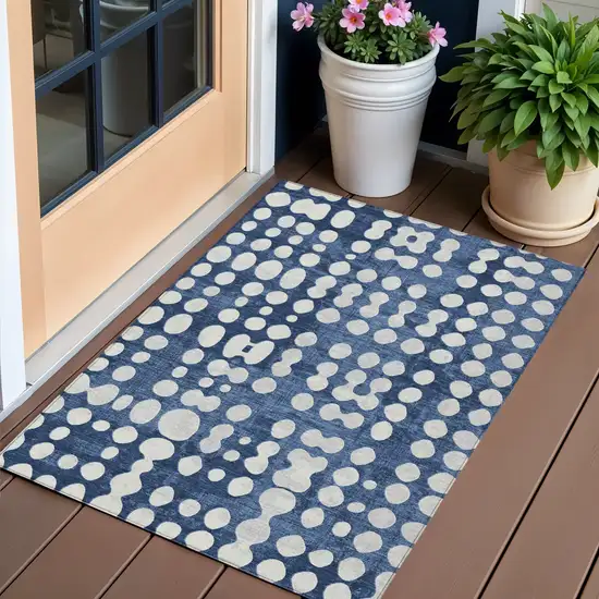 Navy Blue And Ivory Abstract Washable Indoor Outdoor Area Rug Photo 1