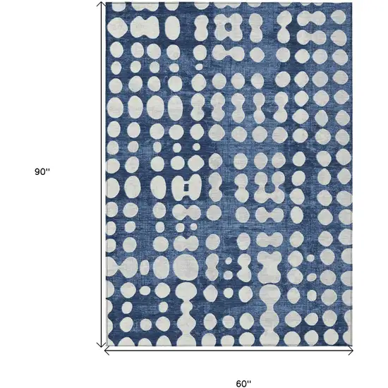 Navy Blue And Ivory Abstract Washable Indoor Outdoor Area Rug Photo 3