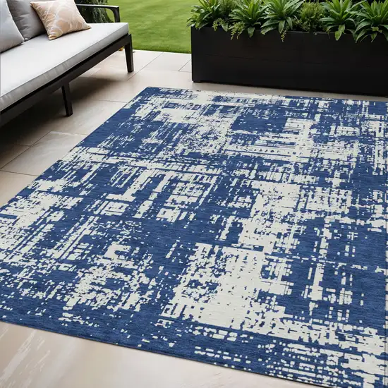 Navy Blue And Ivory Abstract Washable Indoor Outdoor Area Rug Photo 1