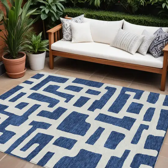 Navy Blue And Ivory Abstract Washable Indoor Outdoor Area Rug Photo 1