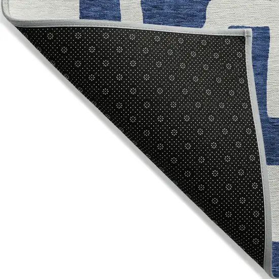 Navy Blue And Ivory Abstract Washable Indoor Outdoor Area Rug Photo 4