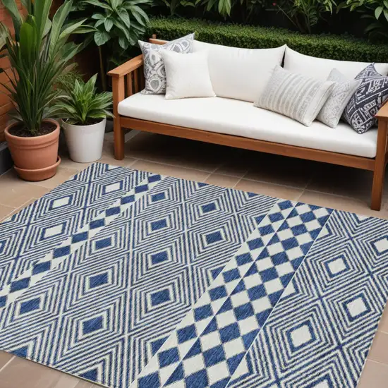 Navy Blue And Ivory Geometric Washable Indoor Outdoor Area Rug Photo 1