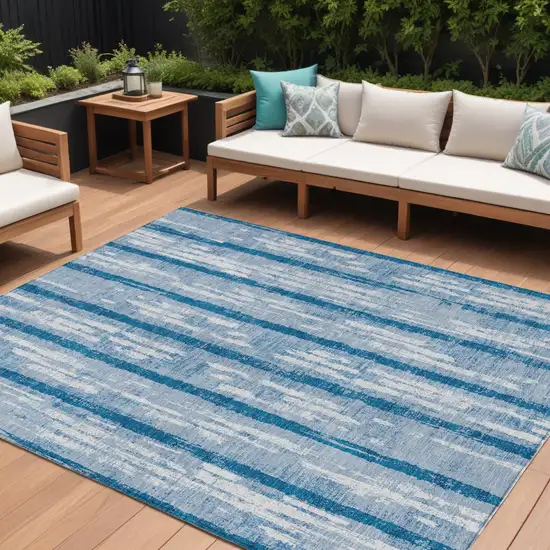 Navy Blue And Ivory Striped Washable Indoor Outdoor Area Rug Photo 1