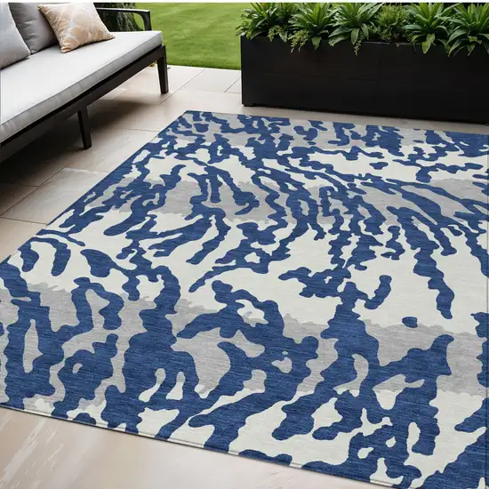 Navy Blue Gray And Ivory Animal Print Washable Indoor Outdoor Area Rug Photo 1