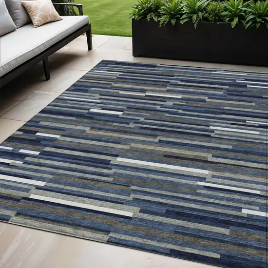 Navy Blue Gray And Ivory Striped Washable Indoor Outdoor Area Rug Photo 1