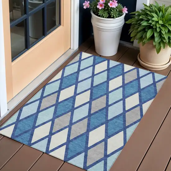 Navy Blue Sky Blue And Ivory Geometric Washable Indoor Outdoor Area Rug Photo 1
