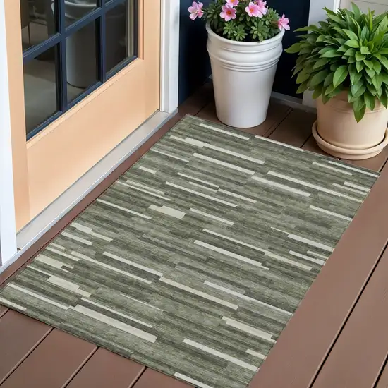 Olive Green Gray And Ivory Striped Washable Indoor Outdoor Area Rug Photo 1