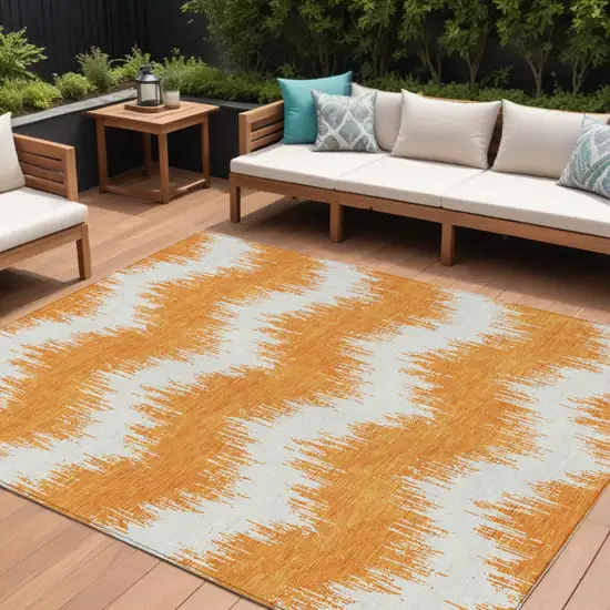 Orange And Ivory Chevron Washable Indoor Outdoor Area Rug Photo 1