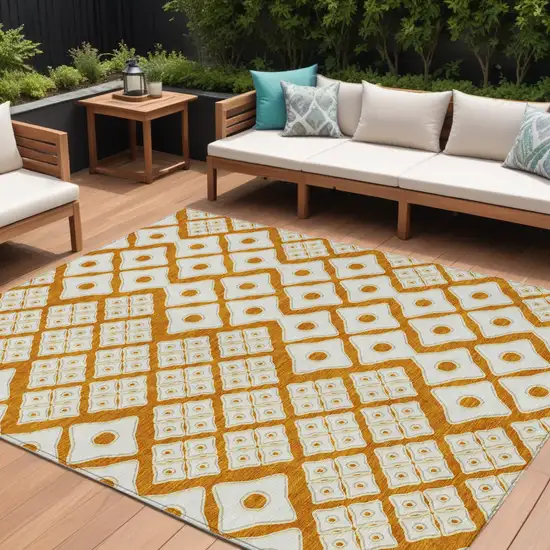 Orange And Ivory Geometric Washable Indoor Outdoor Area Rug Photo 1